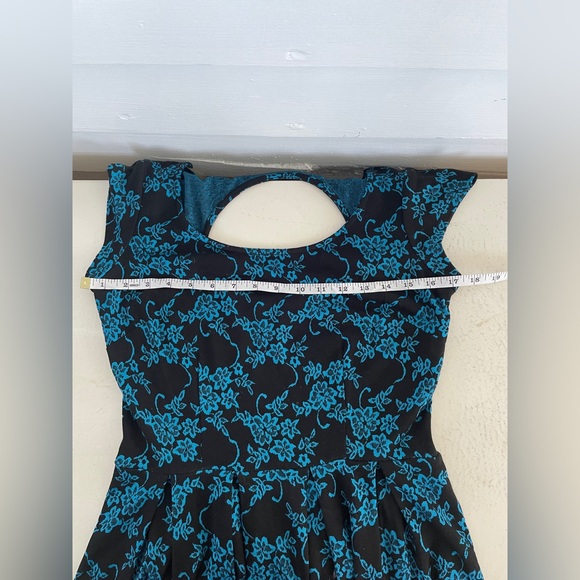 Black Paper Doll Skater Dress with Blue Floral Pattern - Picture 4 of 7